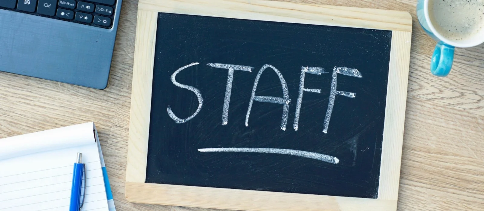 Staff written on a blackboard